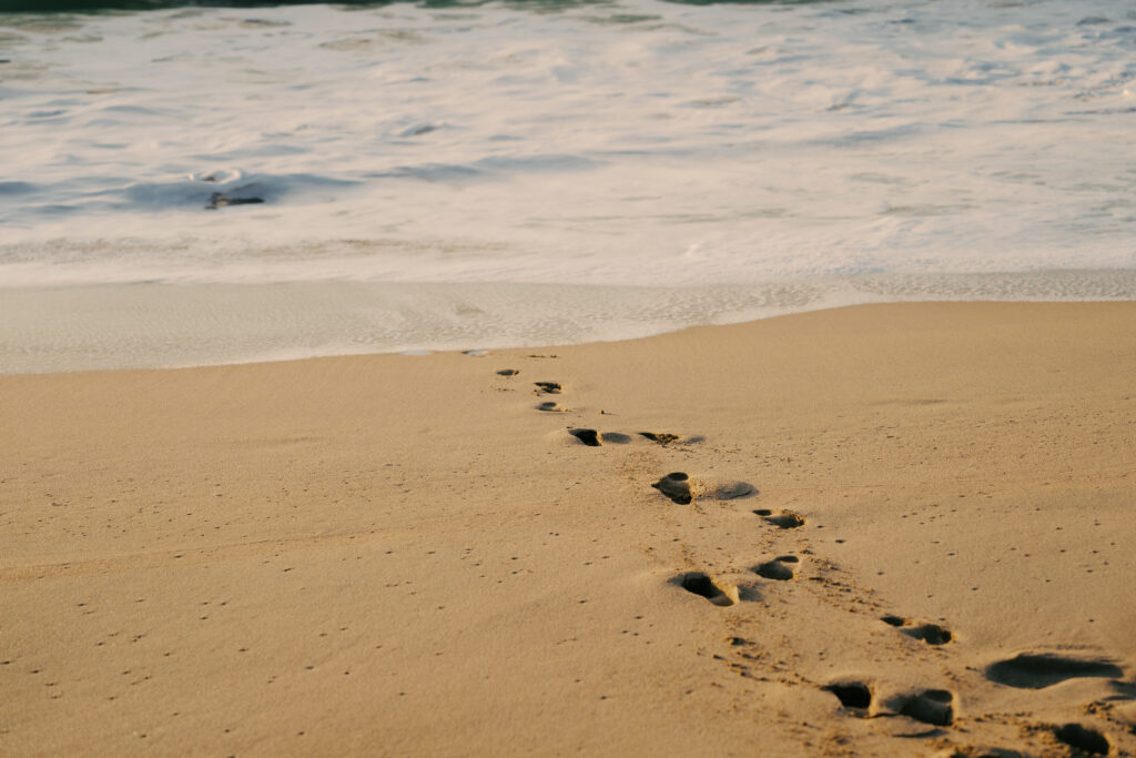 foot prints on the beach