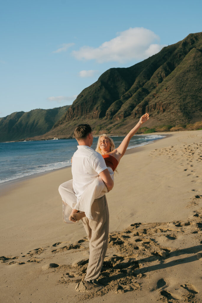 fun couple shoot at the beach