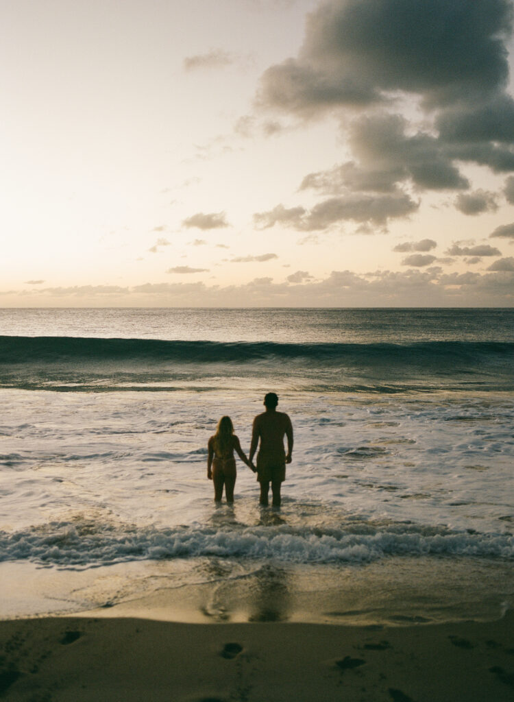 couple in the ocean on film