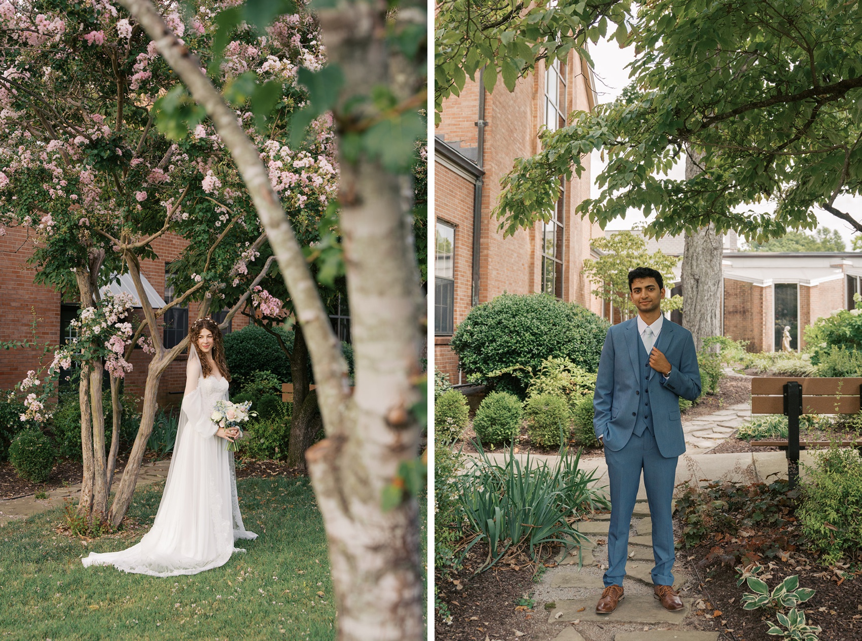 A bride smiles under a pink tree holding her bouquet next to her groom groom in a blue suit holding his lapel in a garden