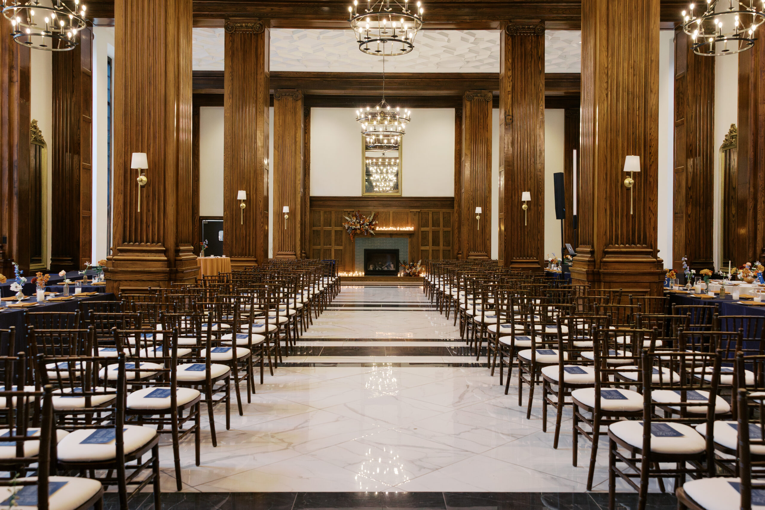 a photo of hotel morgan ballroom styled for a wedding with orange and blue being the theme colors