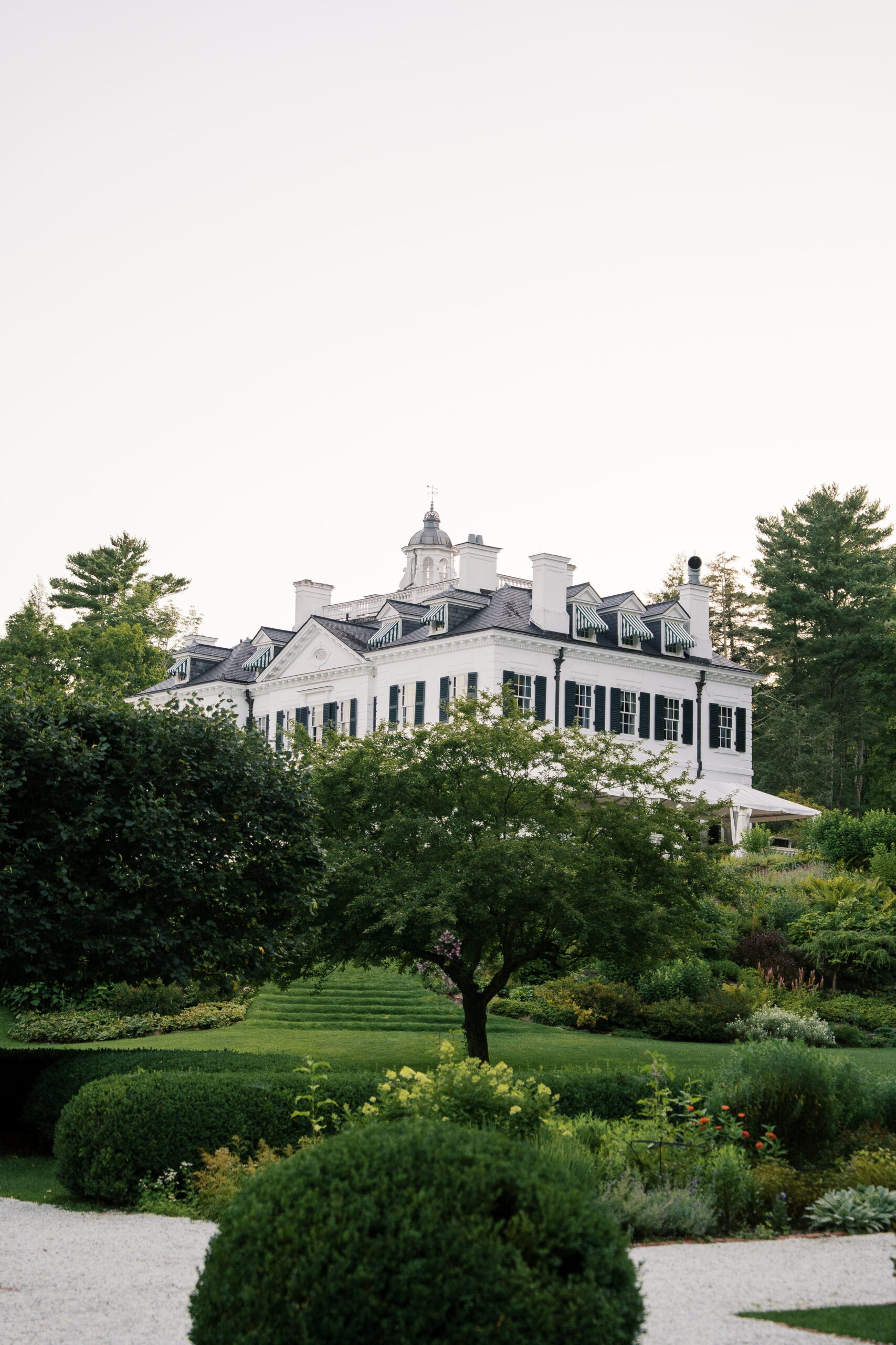 Wide photo of the mansion at Edith Whartons the mount in Lenox massachusetts.