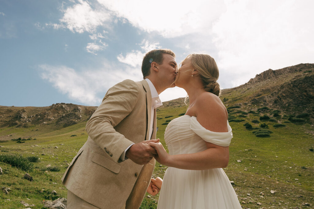 bride an groom kissing