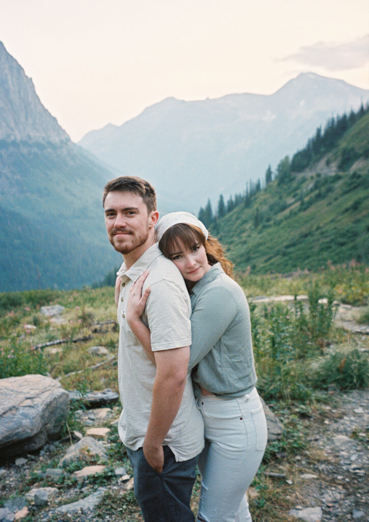 couple hugging during their photoshoot - film on your wedding day