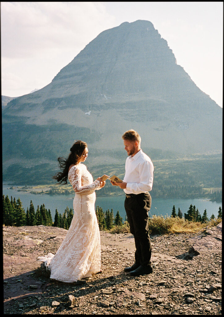 bride and groom reading their vows 