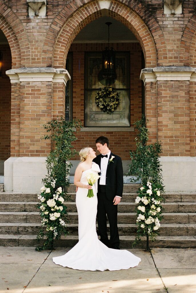 bride and groom looking at each other 