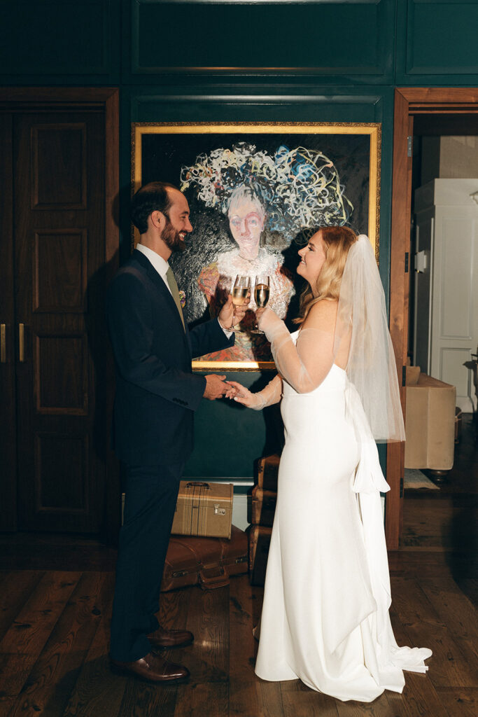 couple celebrating with a glass of champagne 