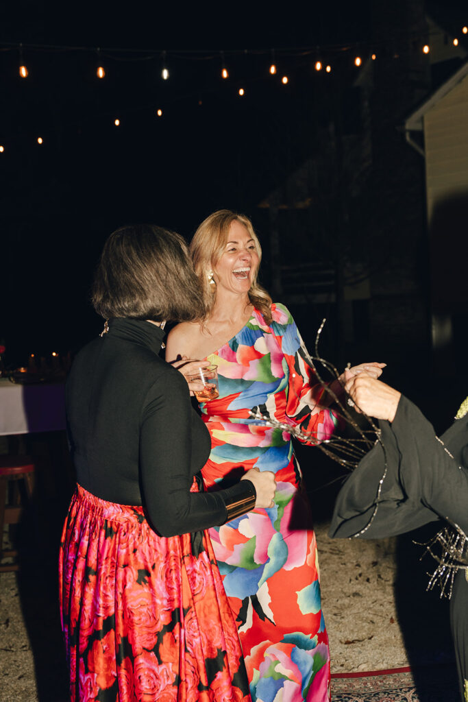 guests dancing at the garden themed wedding reception