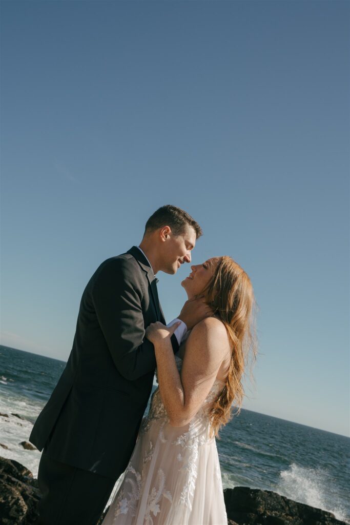 bride and groom smiling at each other 