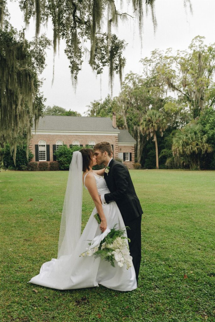 newly married couple kissing