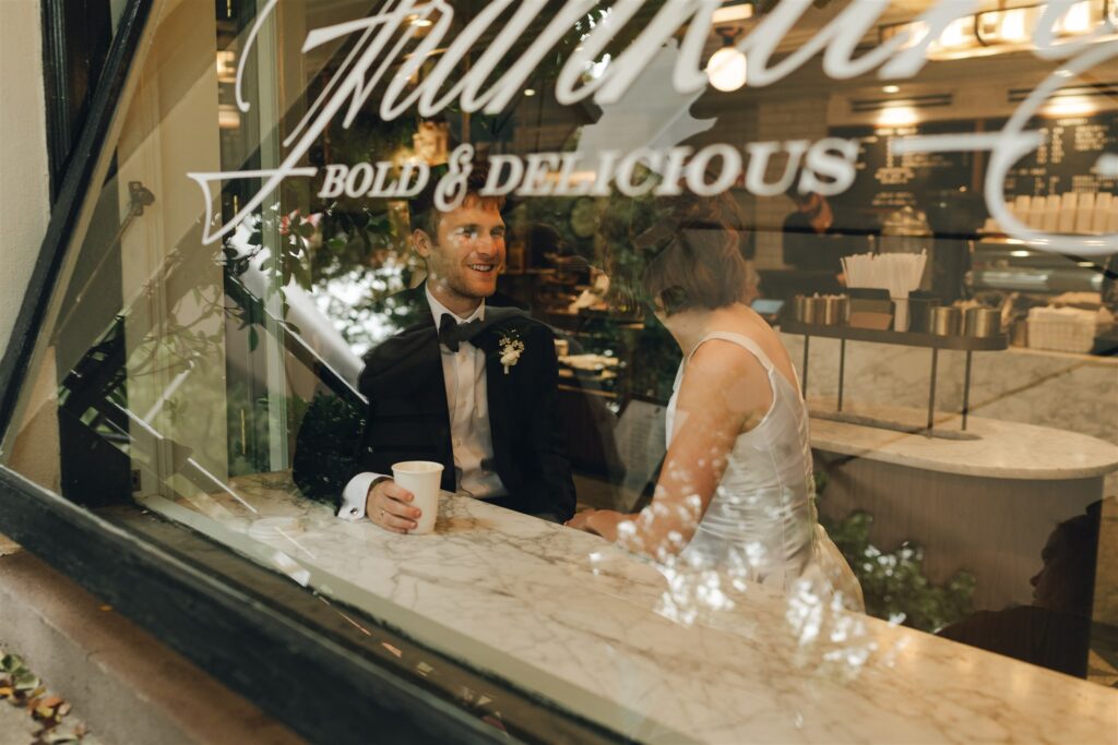 bride and groom at their favorite coffee shop