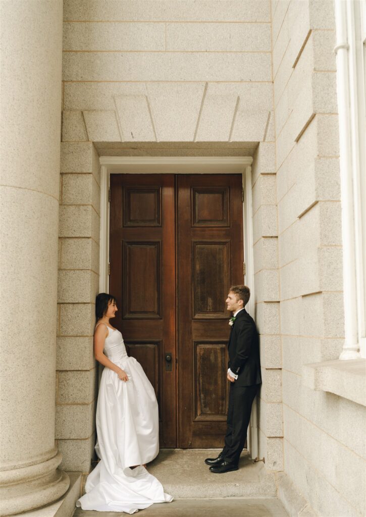 newly married couple looking at each other 