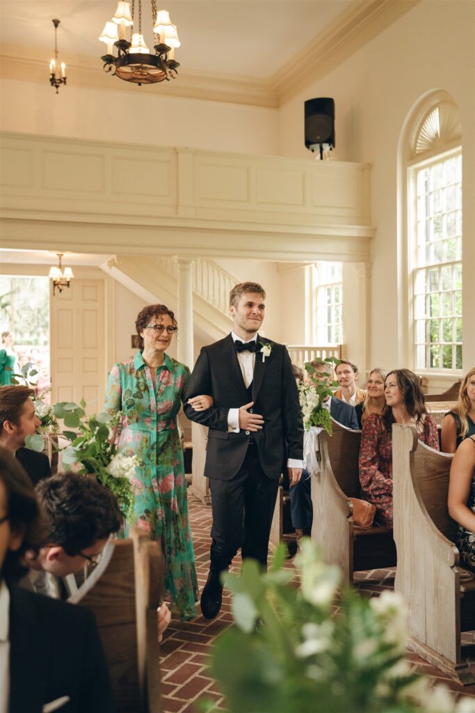 groom at his timeless wedding ceremony