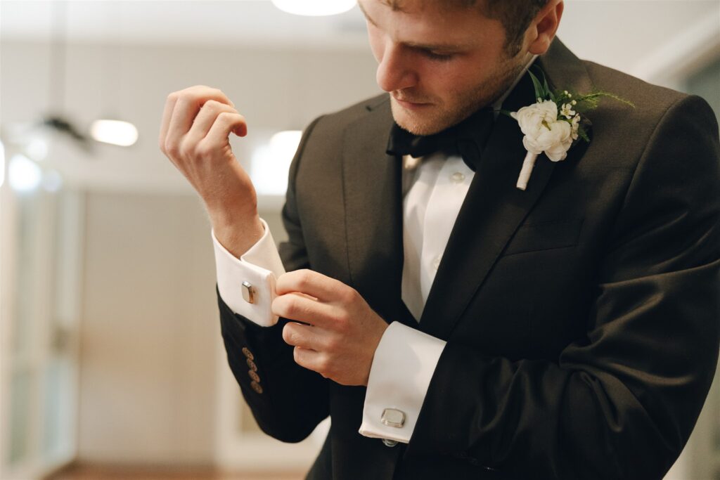 groom getting ready for the wedding ceremony 