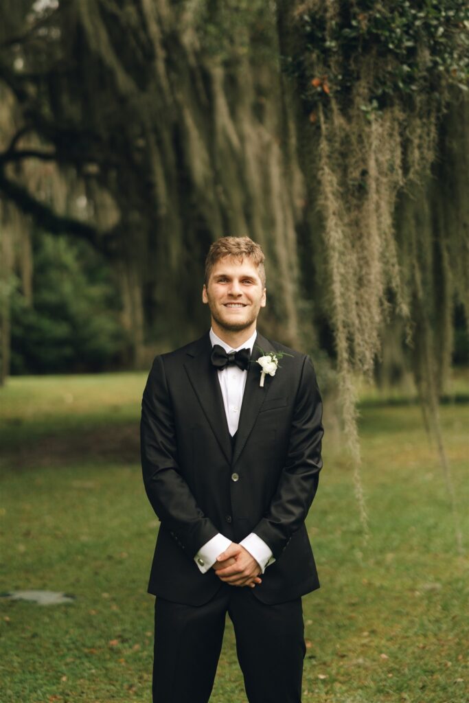 groom before his first look with the bride