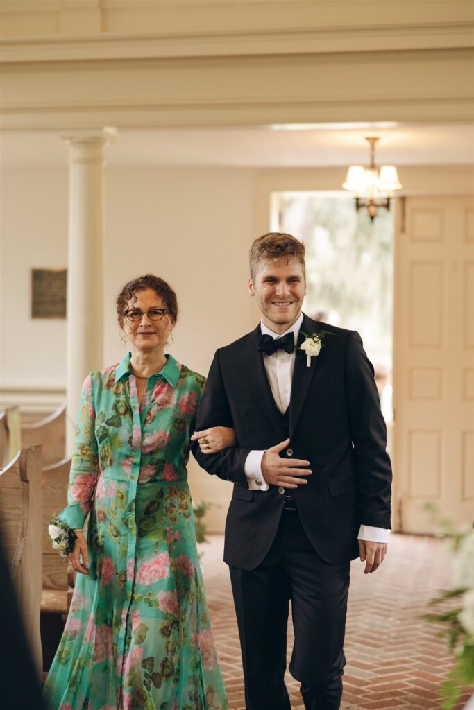 groom walking down the aisle 