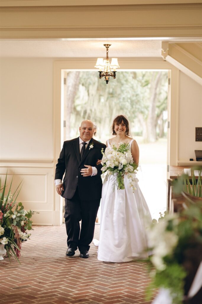 beautiful bride walking down the aisle 