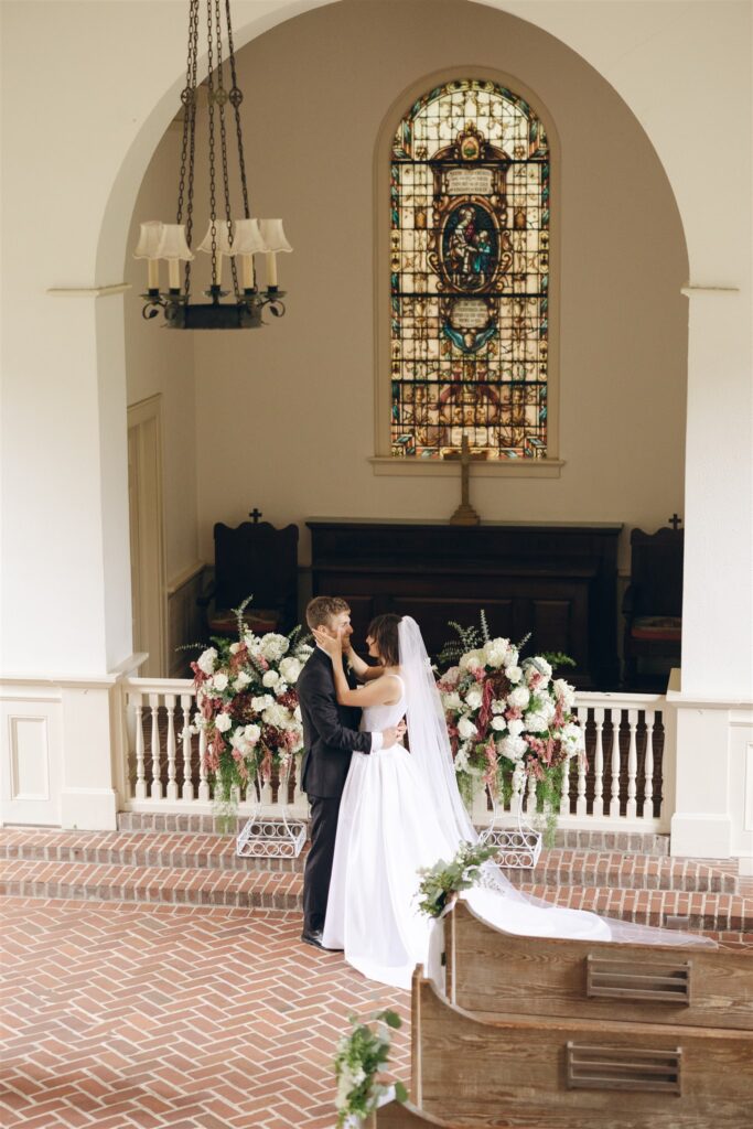 bride and groom looking at each other 