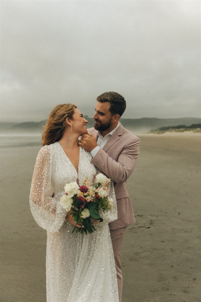 bride and groom kissing during their photoshoot 