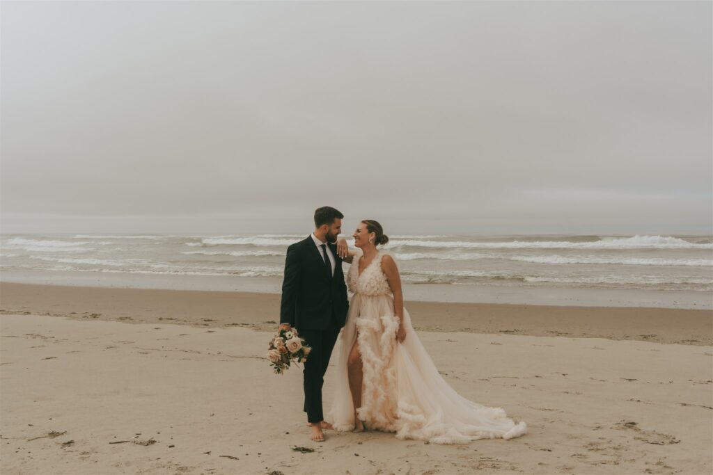 happy couple at their oregon coast elopement 