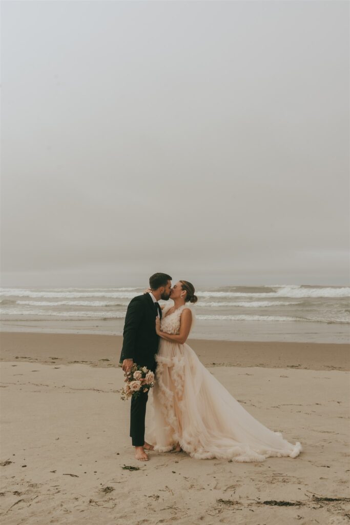 bride and groom kissing during their elopement photoshoot