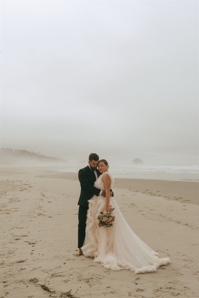 bride and groom hugging during their photoshoot