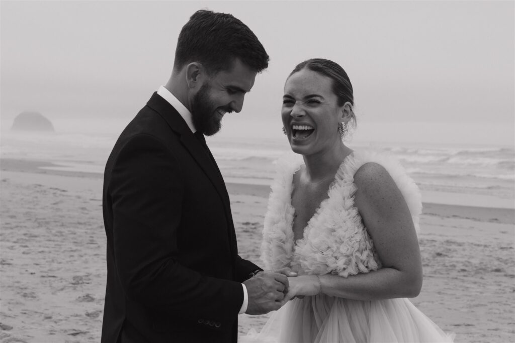 cute couple reading their vows at their oregon coast elopement