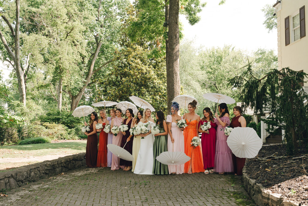 colorful bridemaids with parasols