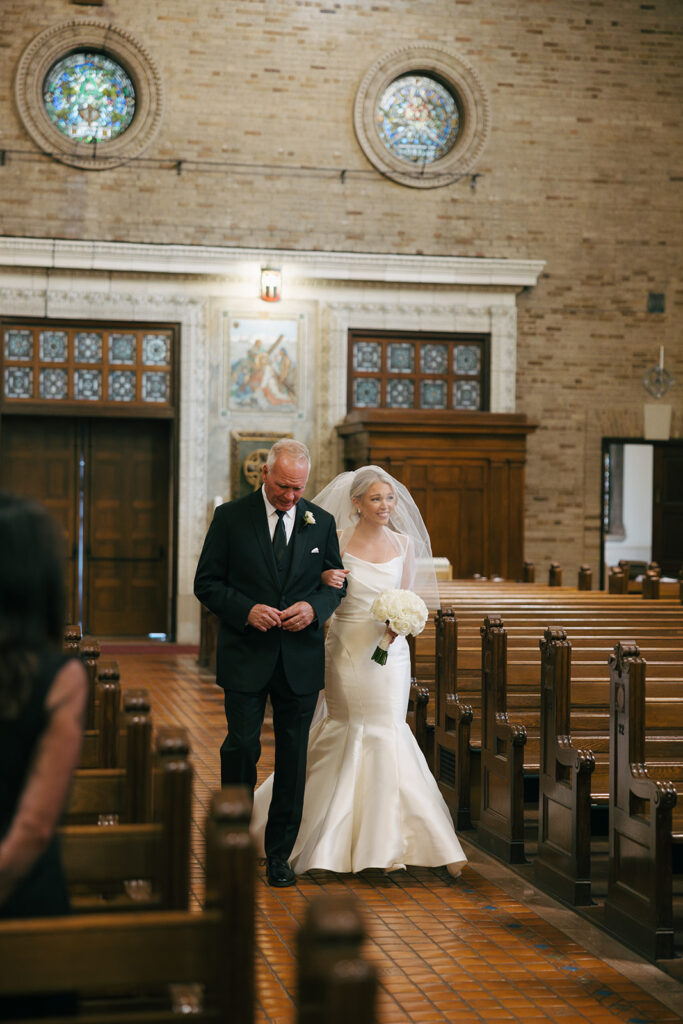 bride walking down the aisle - documentary style photography