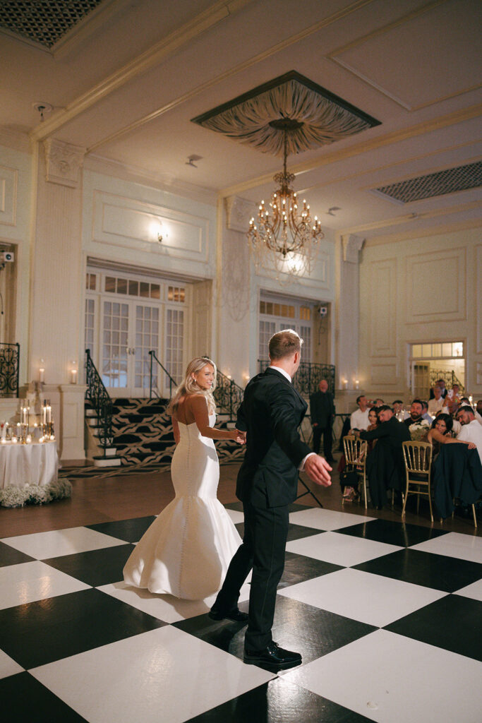 newly married couple dancing at their wedding reception