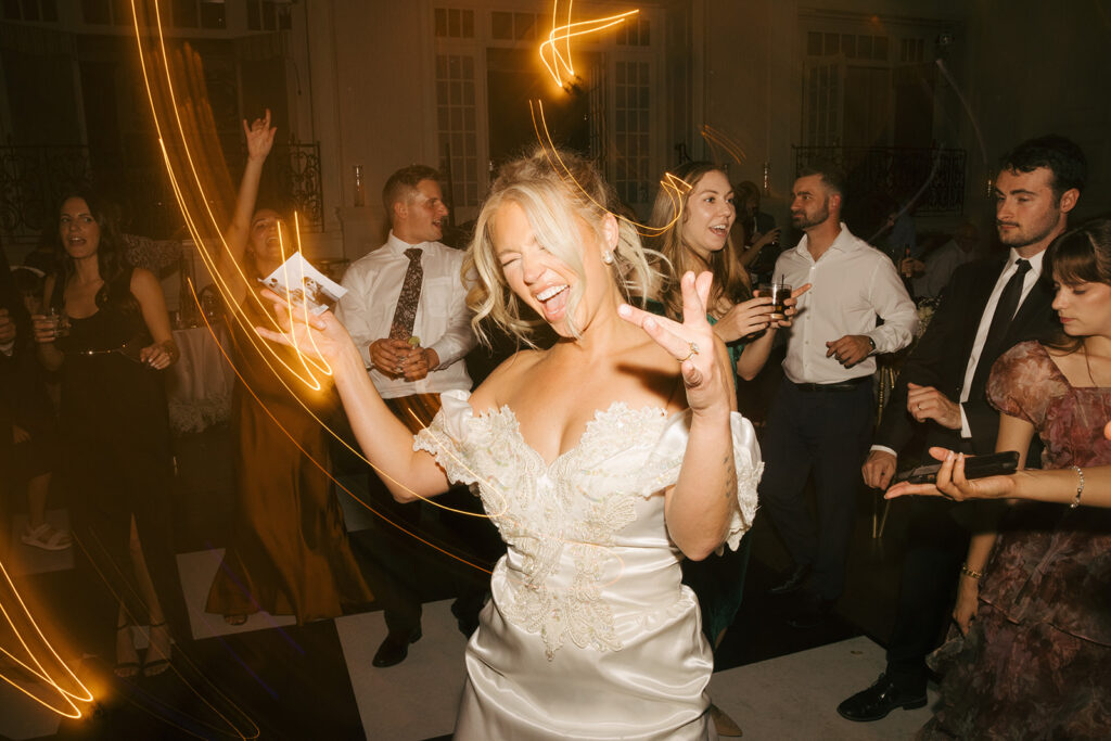 bride dancing at her wedding reception