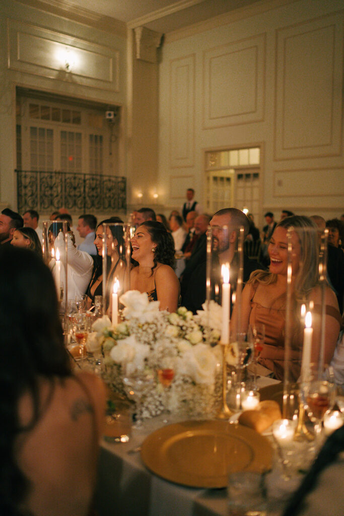 wedding guests toasting for the newlyweds