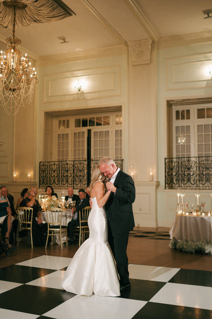 bride and her dad dancing at the wedding reception