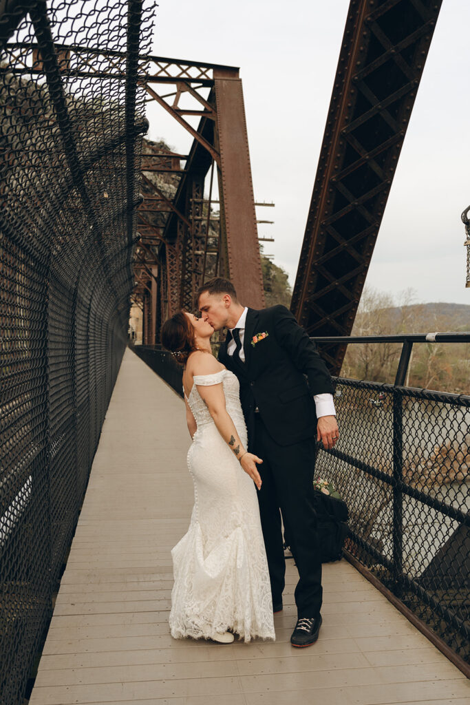 picture of the bride and groom kissing - should you elope?