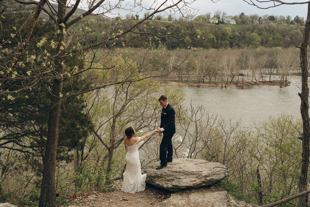 picture of the bride and groom holding hands - should you elope?