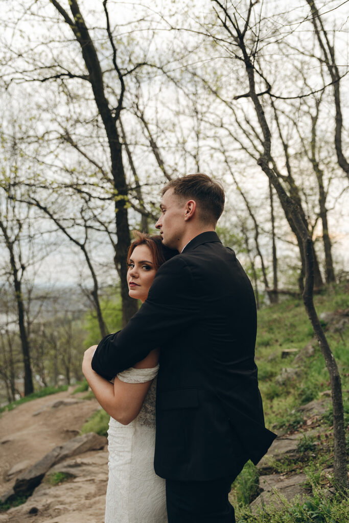 picture of the groom hugging the bride