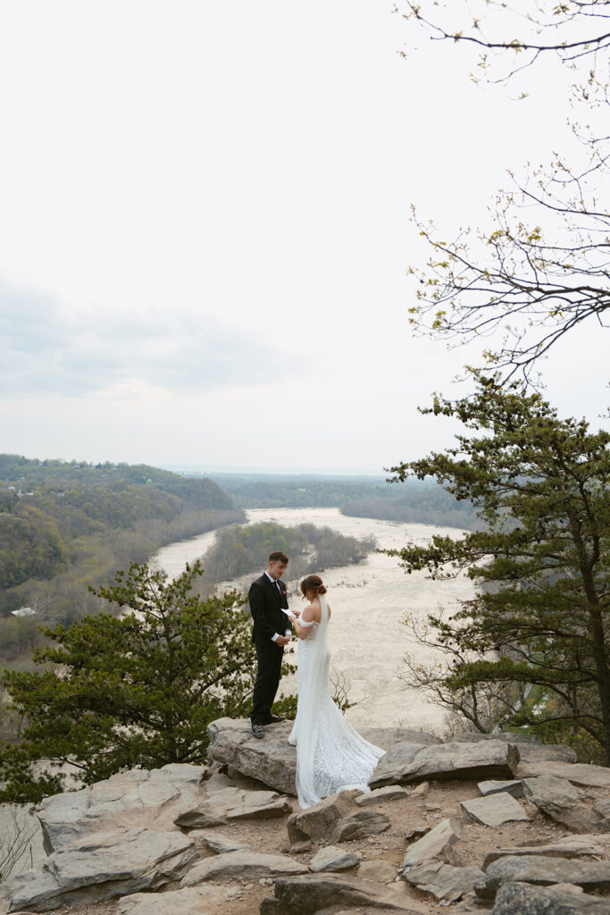 bride and groom reading their private vows 