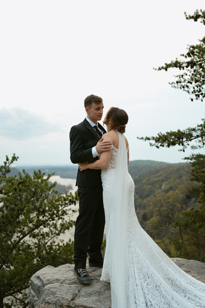 bride and groom looking at each other 