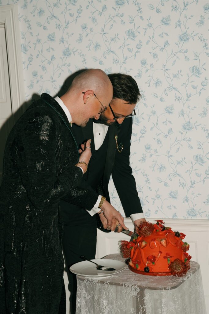 cute couple cutting their elopement cake 