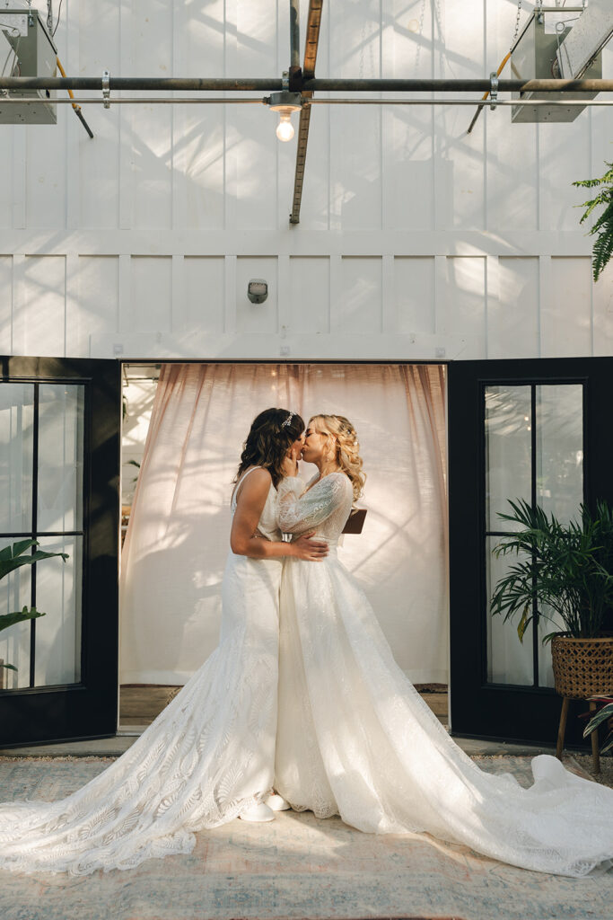 couple kissing after their wedding ceremony 