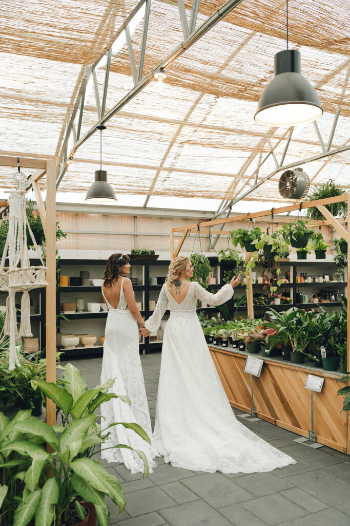 happy couple walking around their wedding venue 