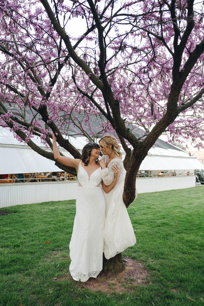 cute picture of the brides kissing 