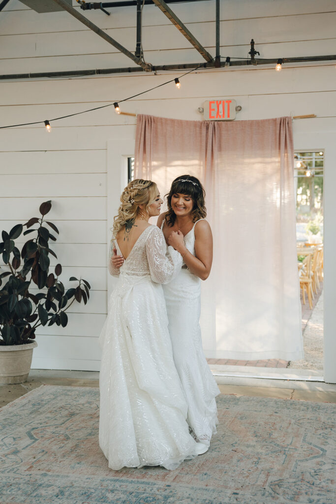 happy newlyweds dancing at the wedding reception