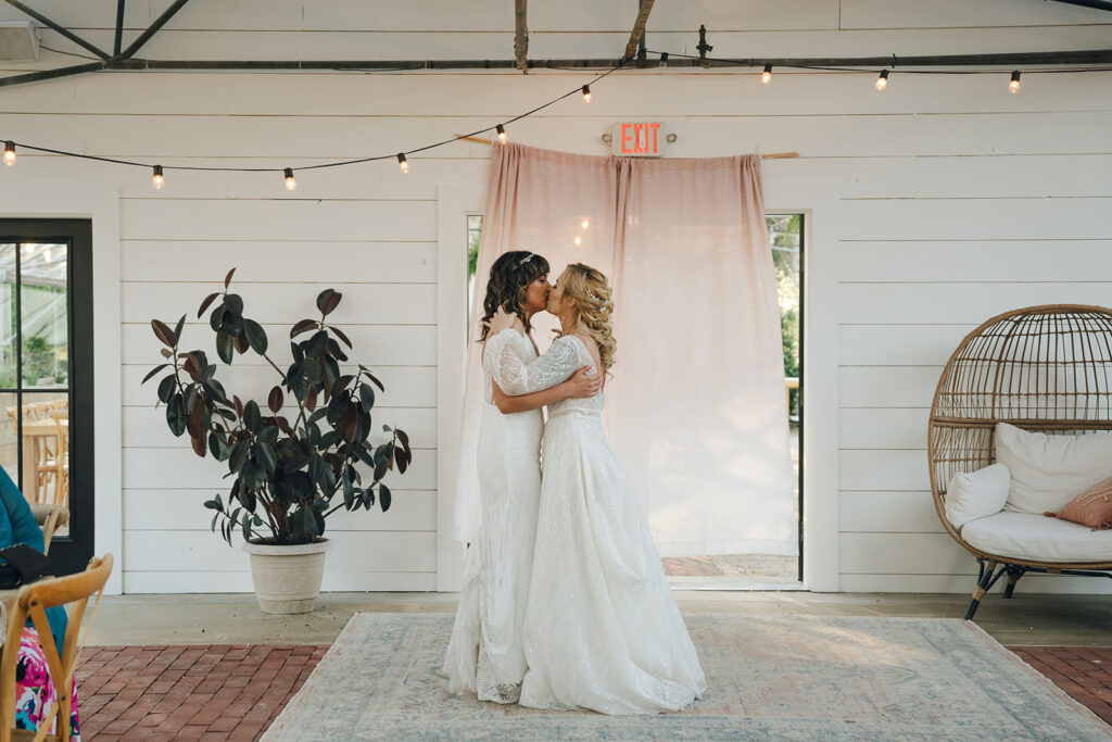 cute couple kissing after their first dance 