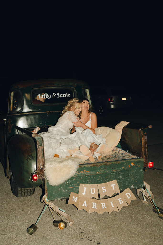 picture of the brides laughing with each other