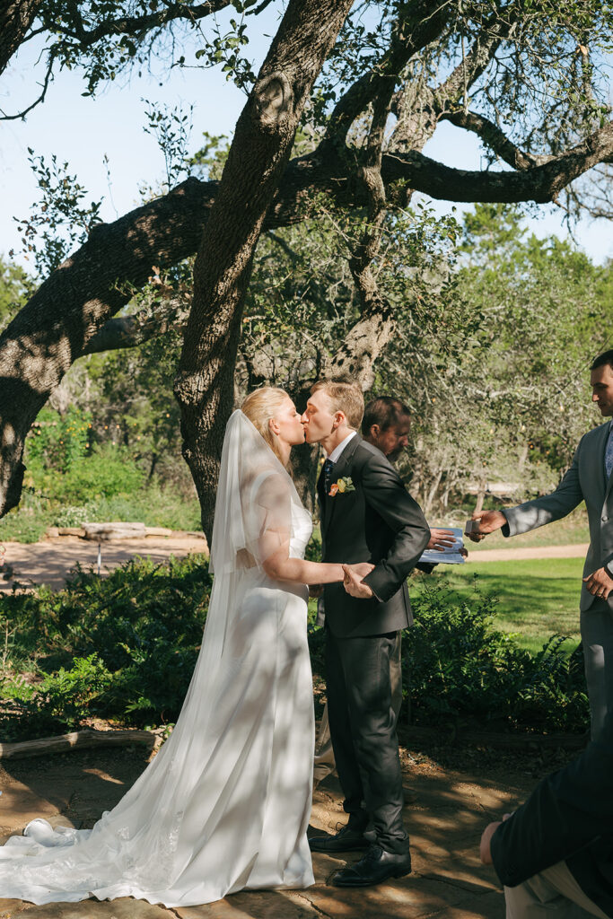 bride and groom kissing 