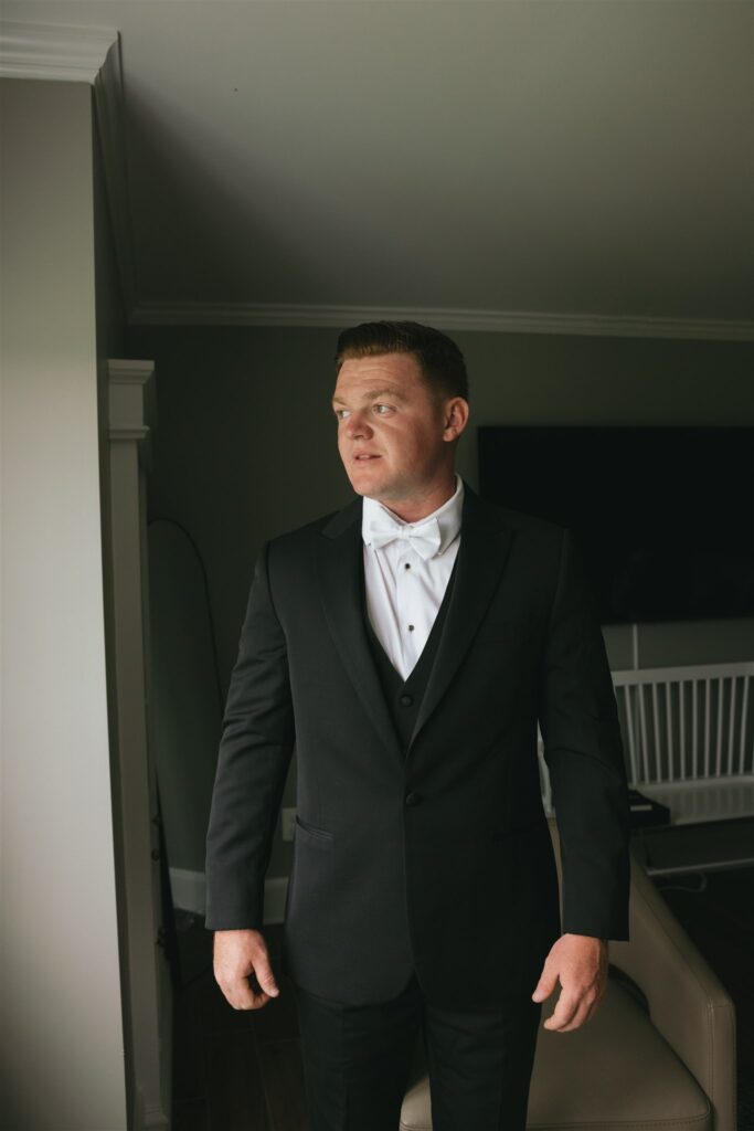 picture of the groom before seeing the bride