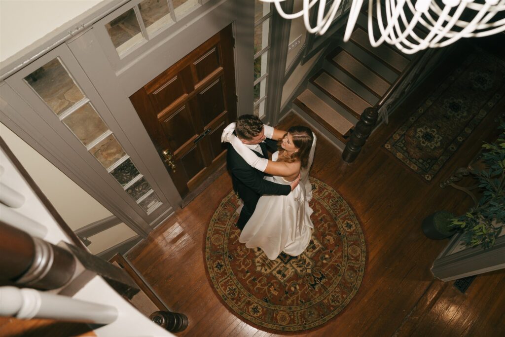 newlyweds dancing before heading to their reception