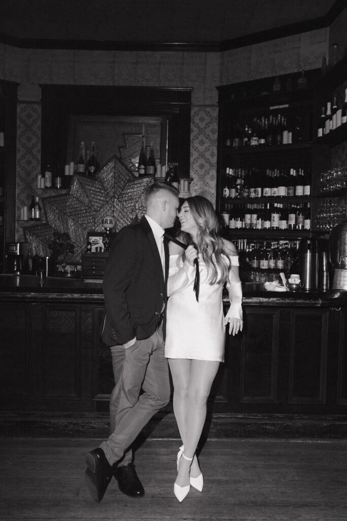 pulling tie at the urban cowboy parlor bar 