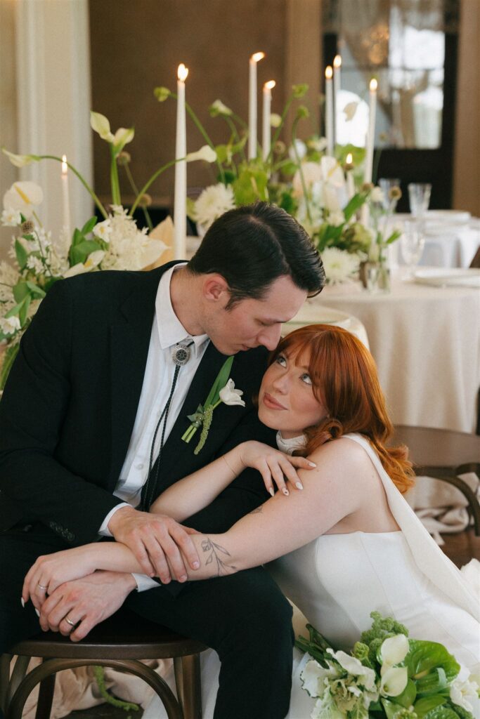 editorial wedding couple leaning in close 